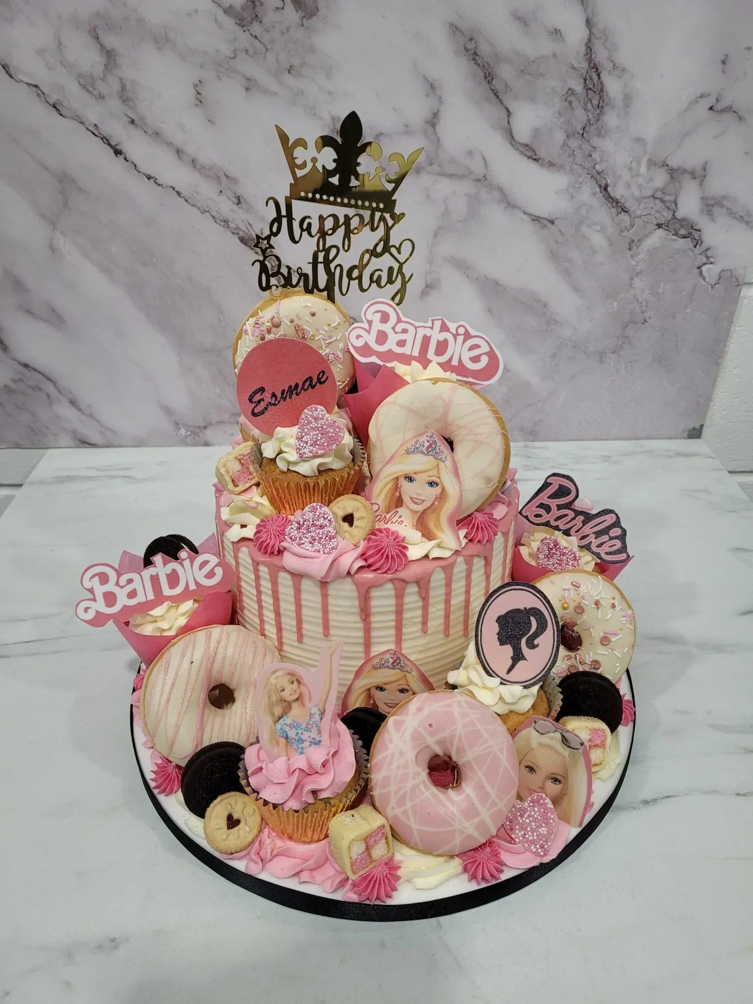 Barbie doll cake, mini doll cakes, cupcakes and a toothache